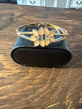 Gold Plated floral bracelet with rhinestones and stones